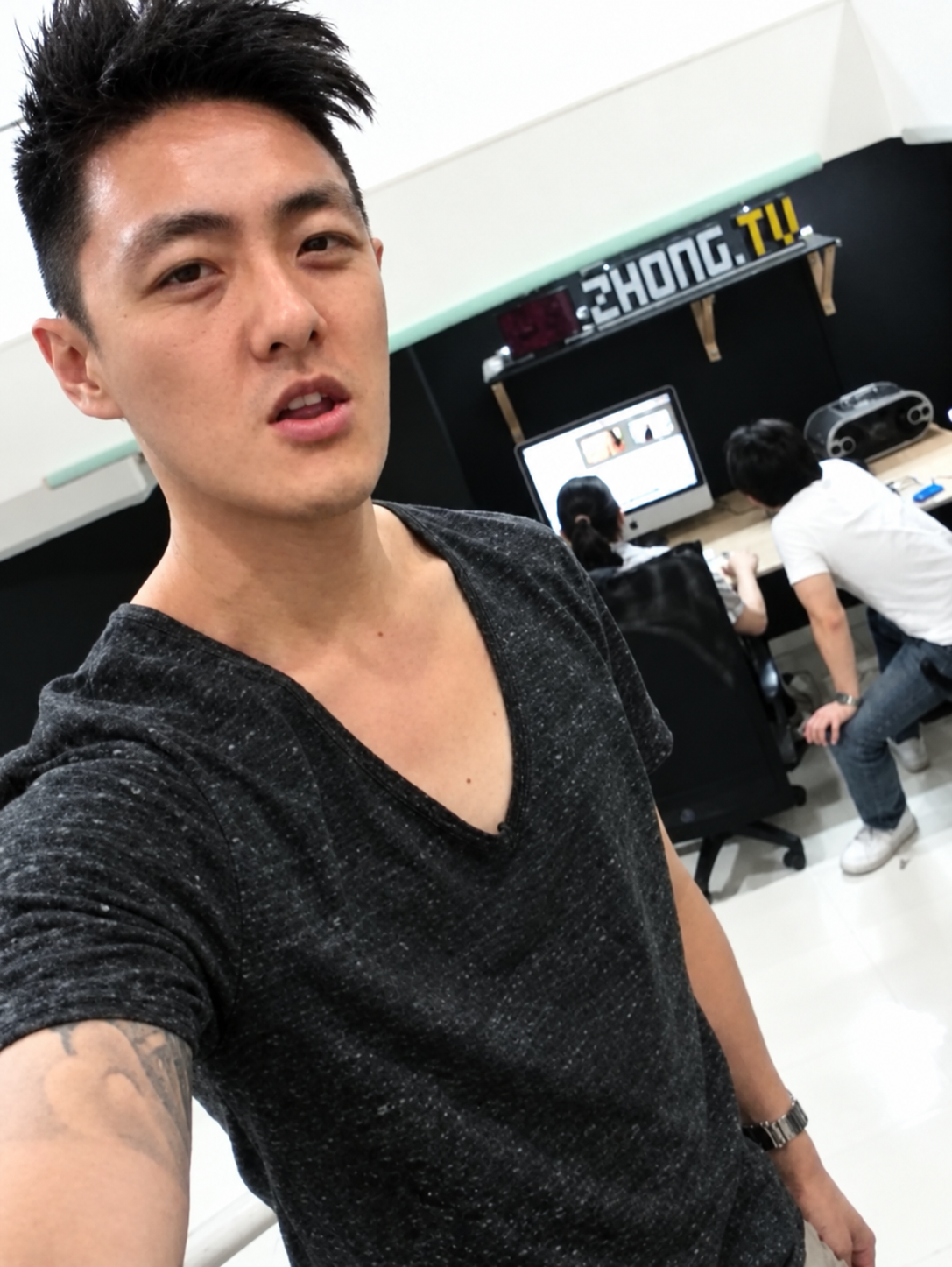 Stanley Yang taking a studio selfie