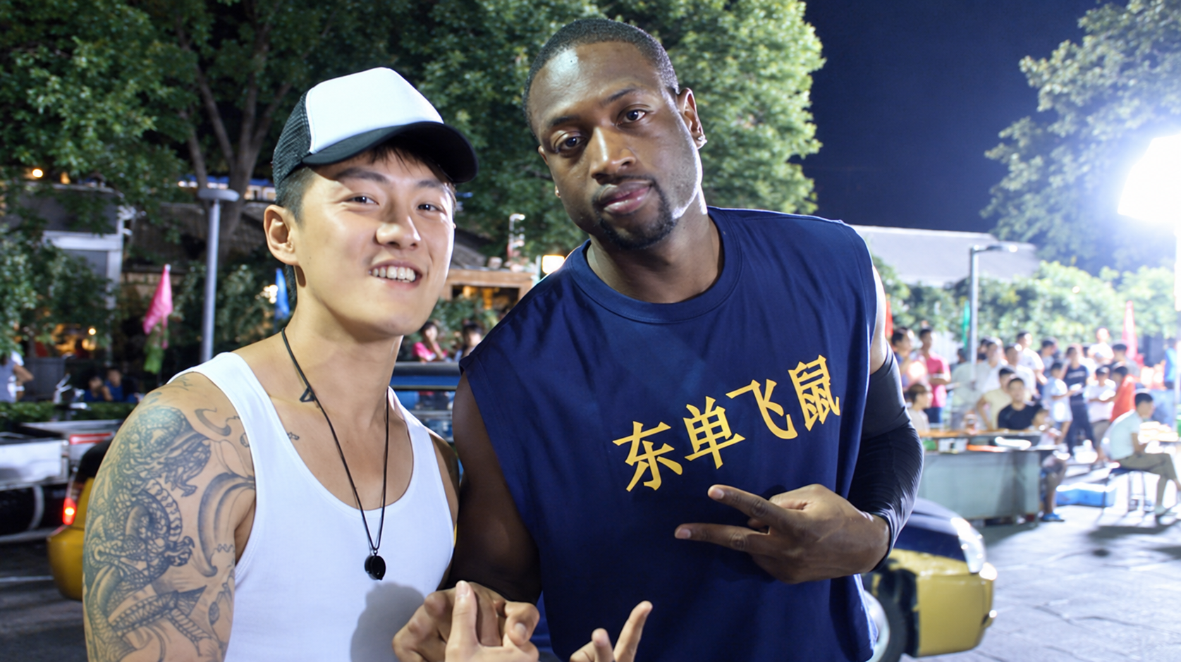 Stanley Yang with Wade at an outdoor event