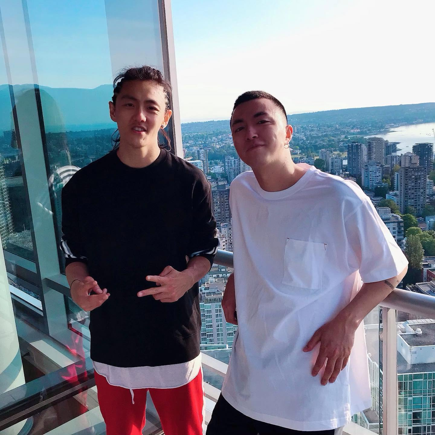 Stanley Yang with Jony J overlooking Vancouver