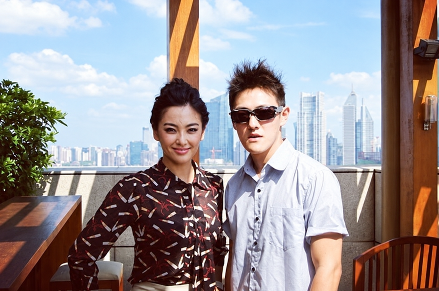 Stanley Yang with Kitty overlooking the city