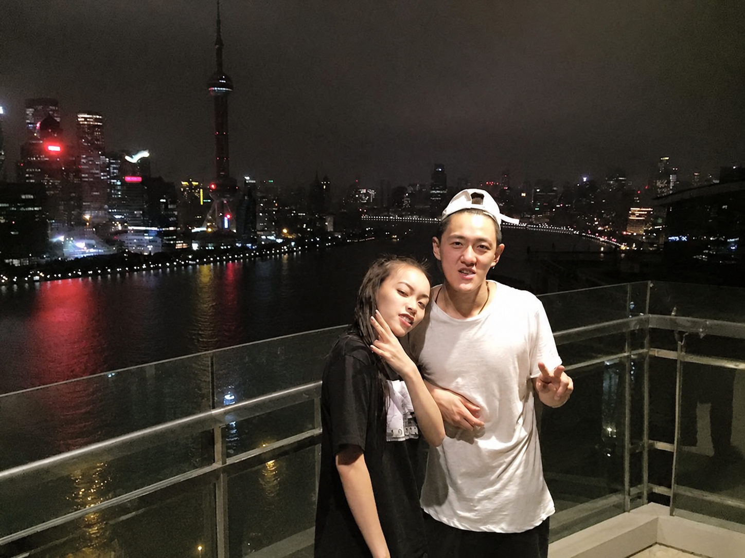 Stanley Yang and Lexie above the Shanghai waterfront